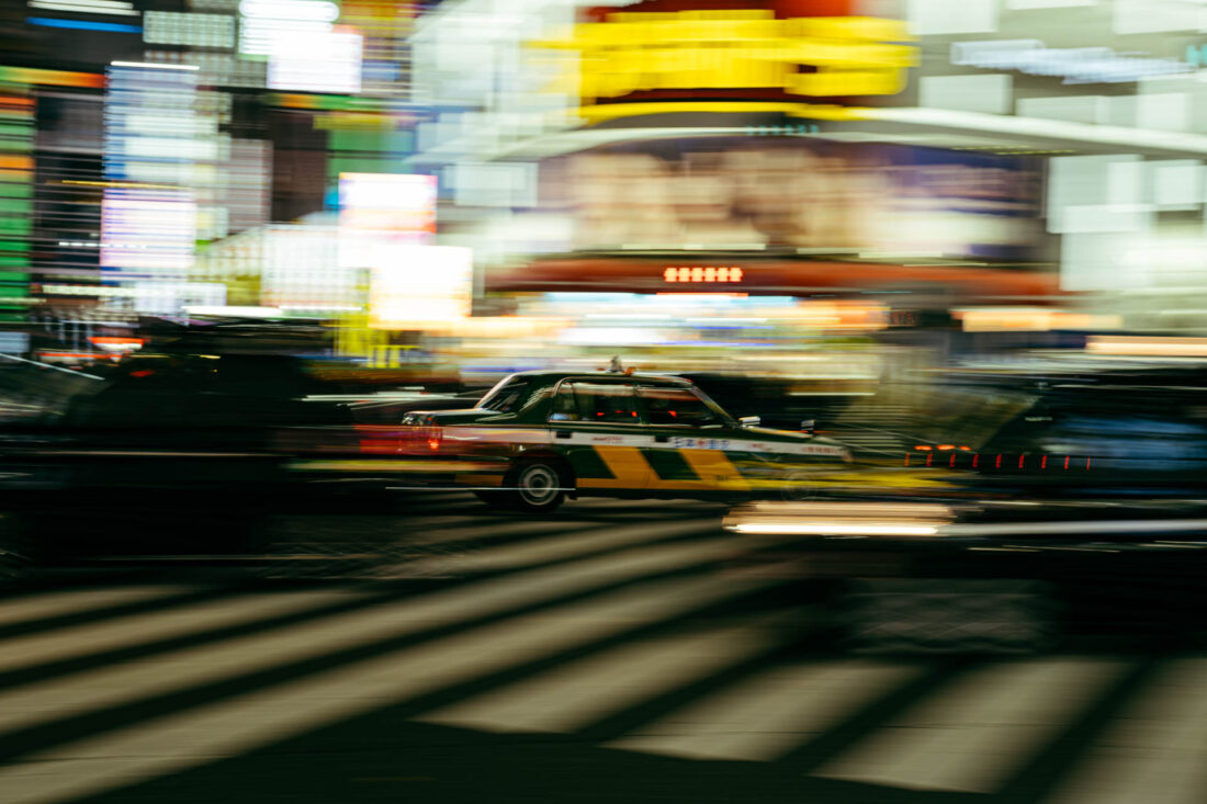crosswalk pan shot vi by robert mangelmann | 20231124tokyo_0524
