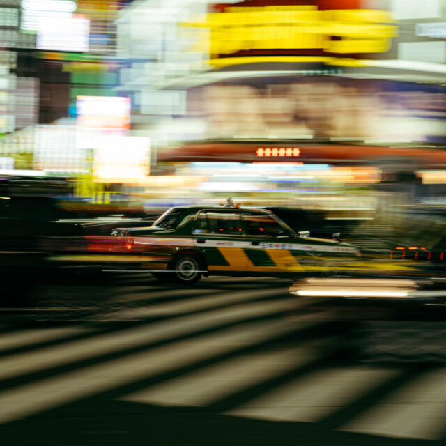 crosswalk pan shot vi by robert mangelmann | 20231124tokyo_0524