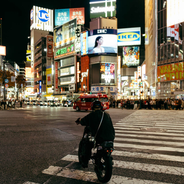 biking shibuya crossing by robert mangelmann | 20231124tokyo_1118