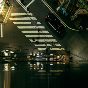 crosswalk reflection by robert mangelmann | 20231129tokyo_304